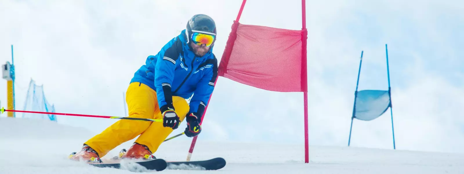 Skier attacks a gate